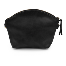 Load image into Gallery viewer, Back view of the Mhambi sling bag featuring a magnetic pocket for easy access.
